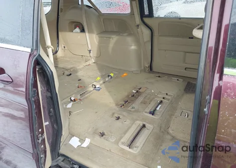 2010 Honda Odyssey Ex-L z USA, uszkodzony, nr VIN 5FNRL3H75AB058416